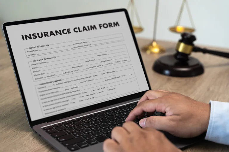 2insurance policy writing with document lawyers office closeup practices policies