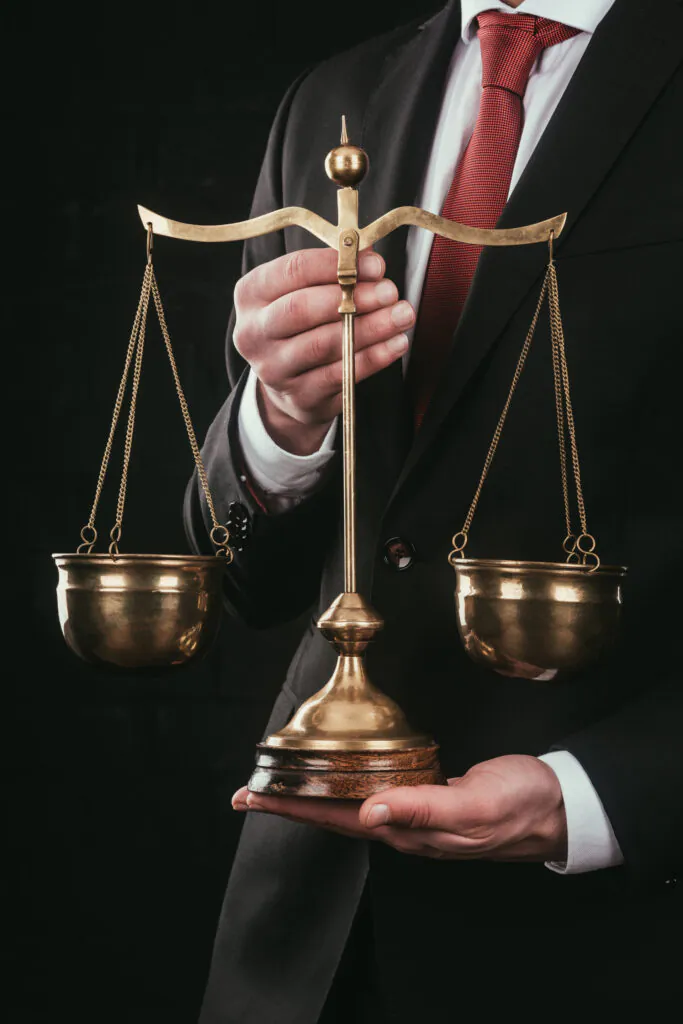 cropped shot of lawyer holding justice scales isol 2023 11 27 05 03 19 utc